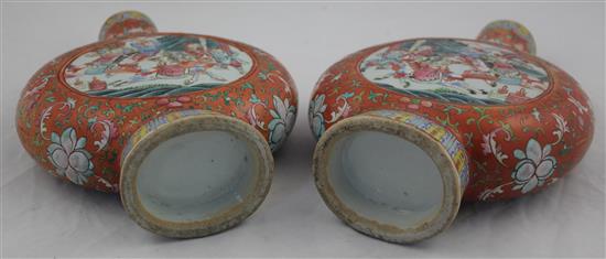 A pair of Chinese famille rose moon flasks, 19th century, 24.2cm, one neck repaired, slight losses to handles